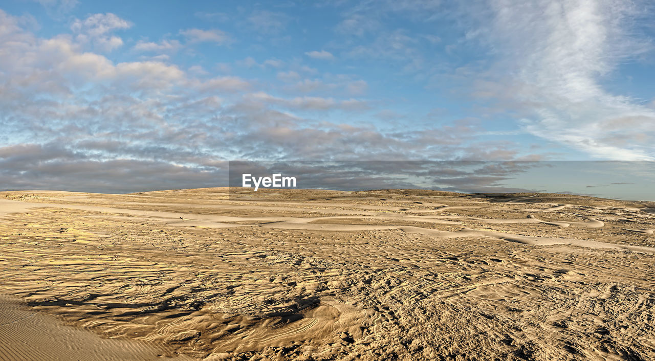 Scenic view of desert against sky