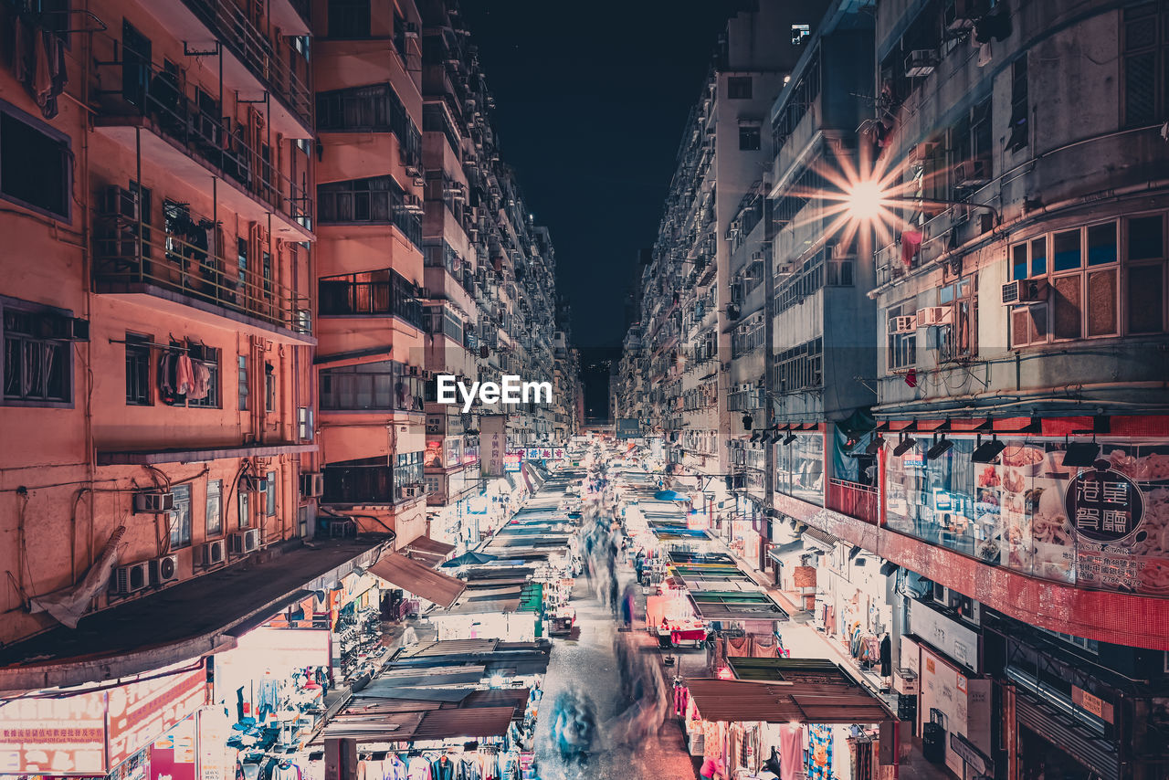 Illuminated buildings in city at night