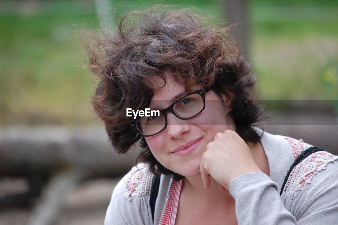 Portrait of woman with curly hair