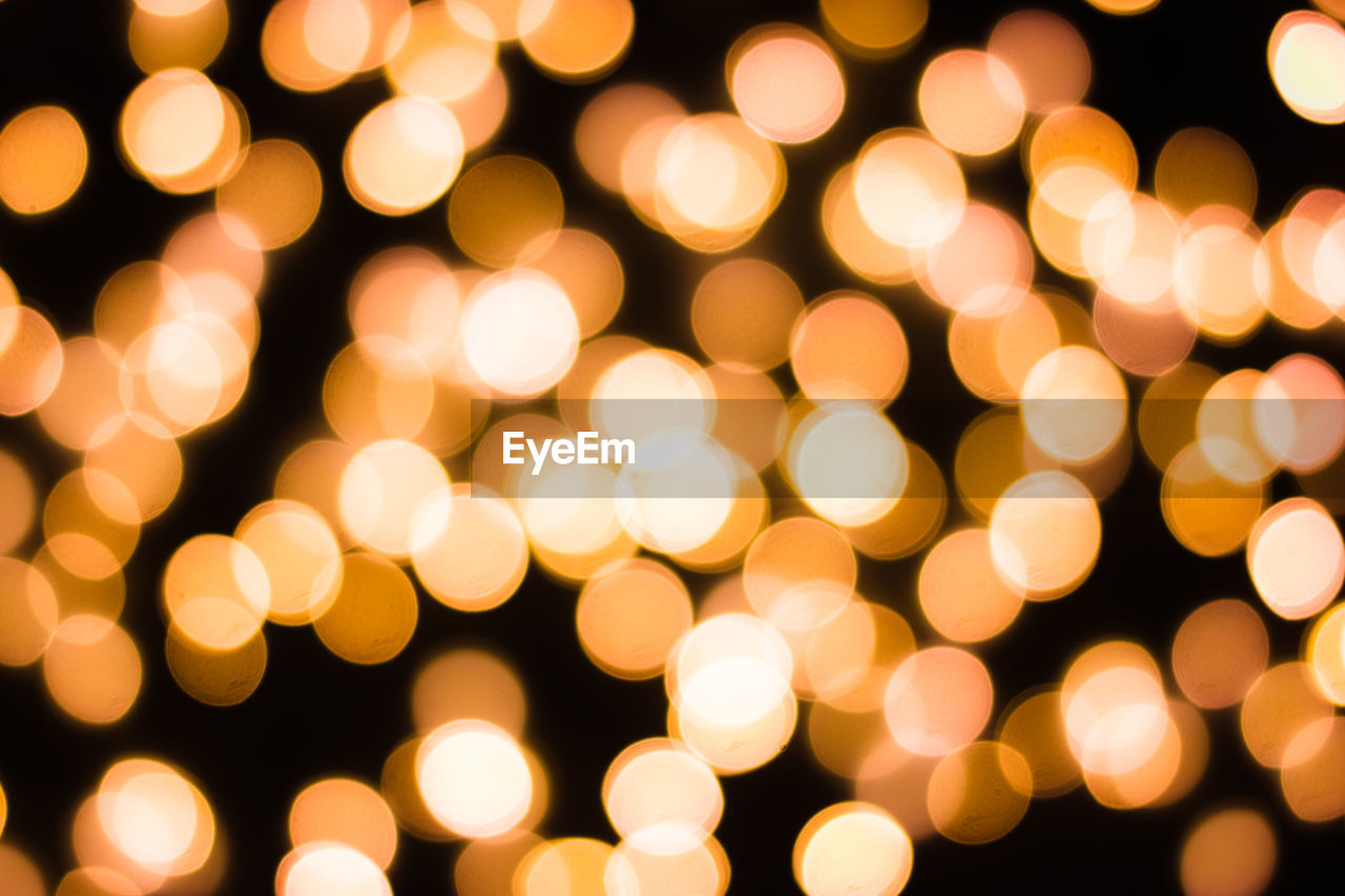 Defocused image of illuminated christmas lights