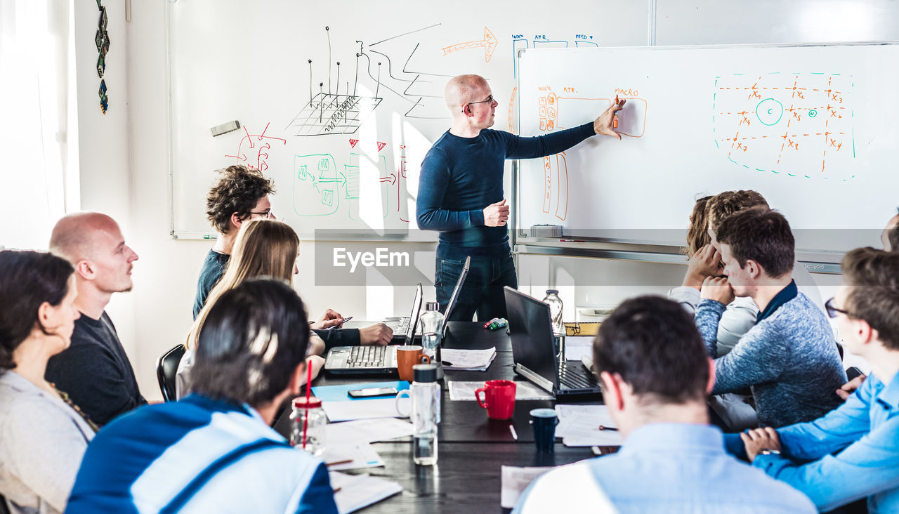 business colleagues working in meeting