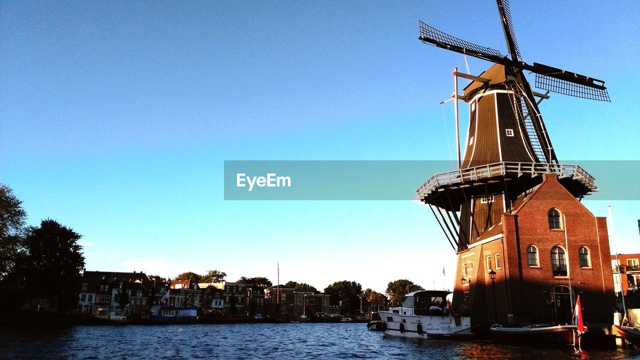 LOW ANGLE VIEW OF TRADITIONAL WINDMILL