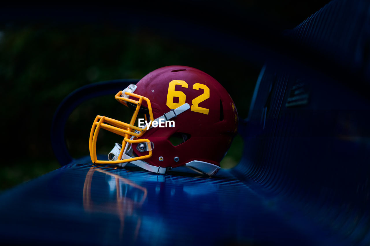 High angle view of illuminated football helmet