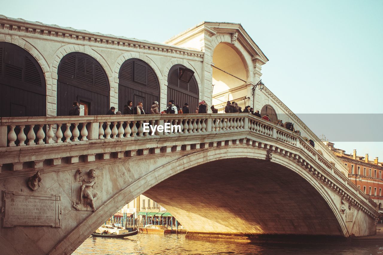 Low angle view of arch bridge against sky