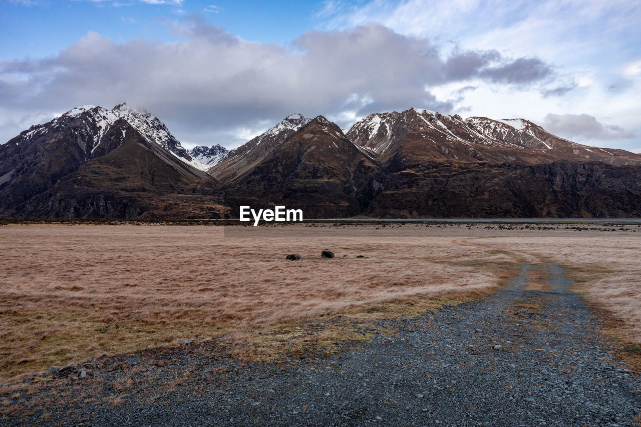 Scenic view along the mount cook road alongside with snow capped southern alps and majestic mt cook.