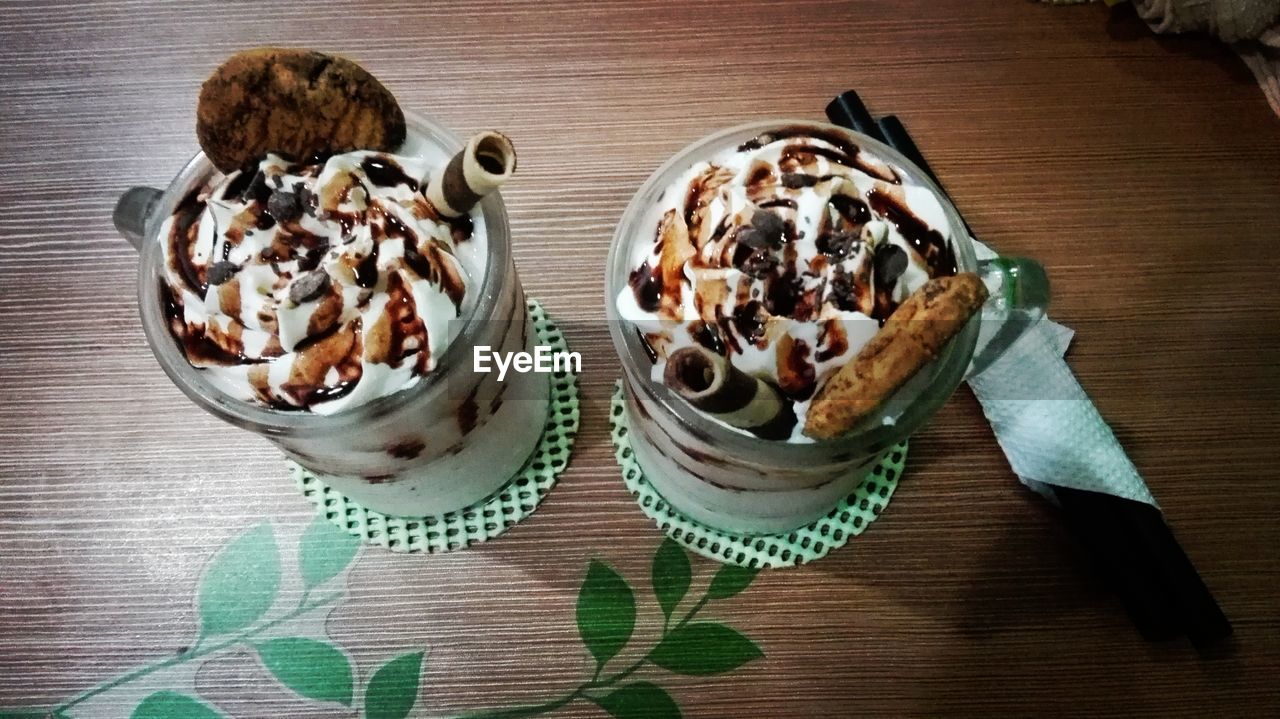 High angle view of ice cream served on table