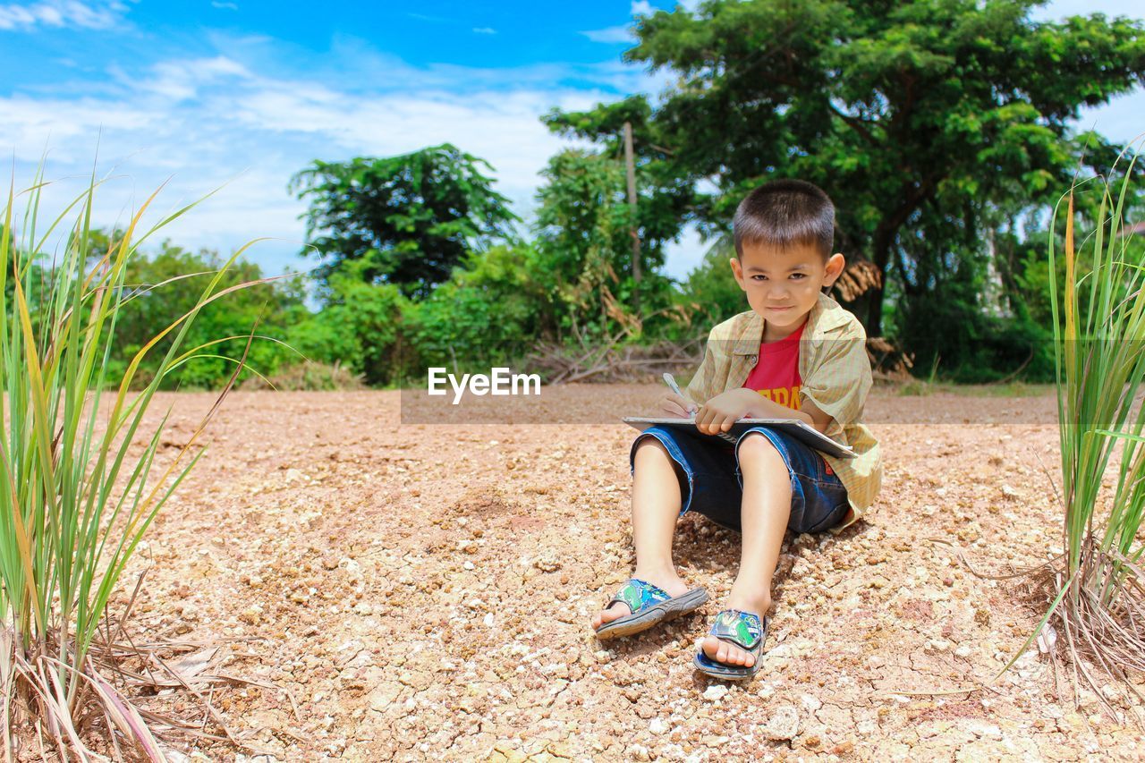 Standing of a small child in the garden