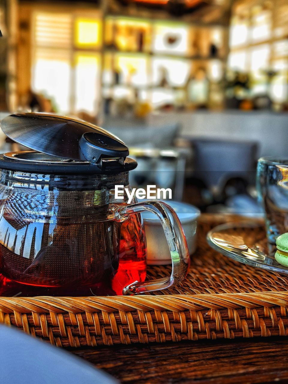 Close-up of drink in glass jar on table at restaurant