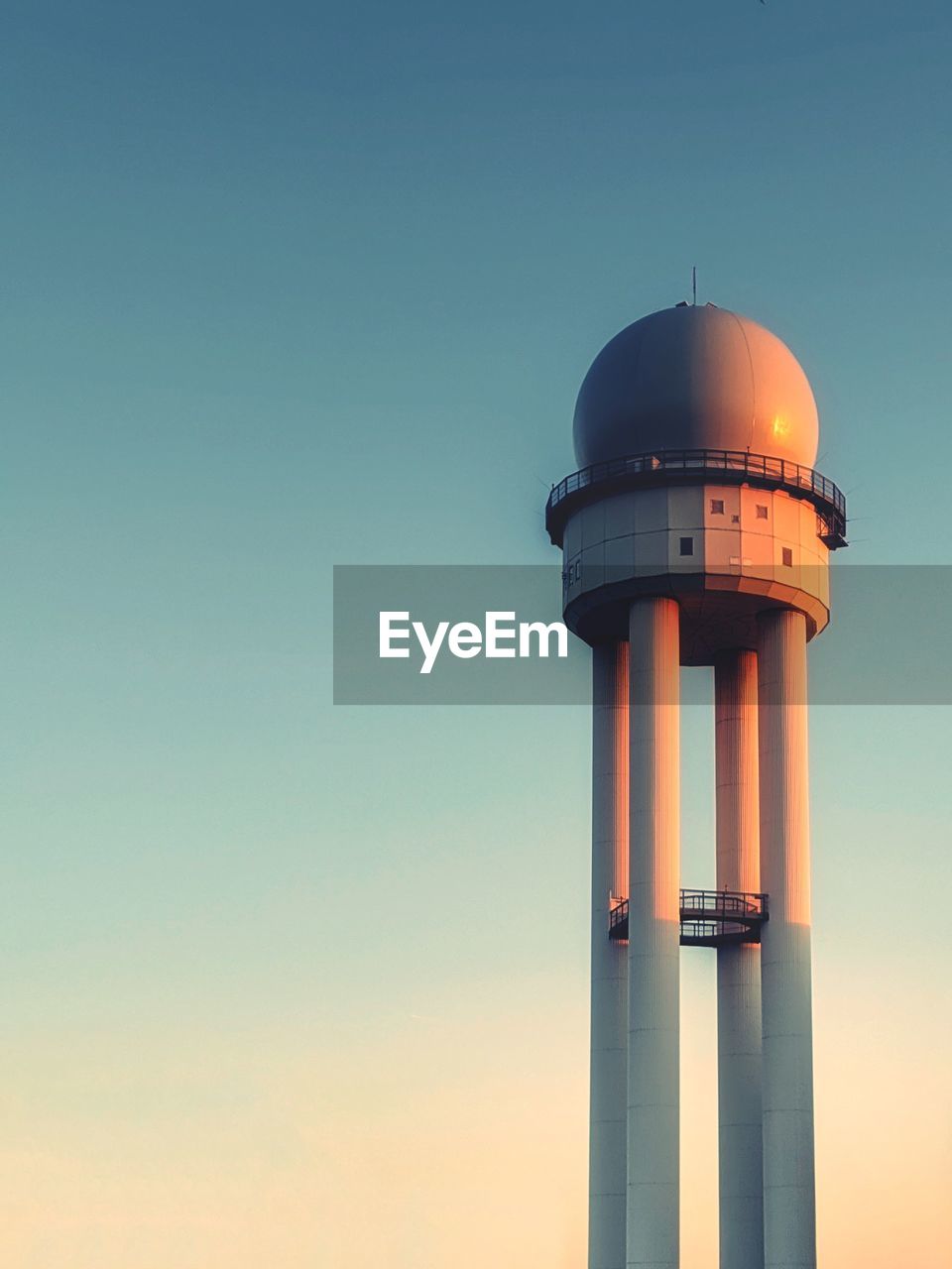 Radar tower at tempelhof during sunset.