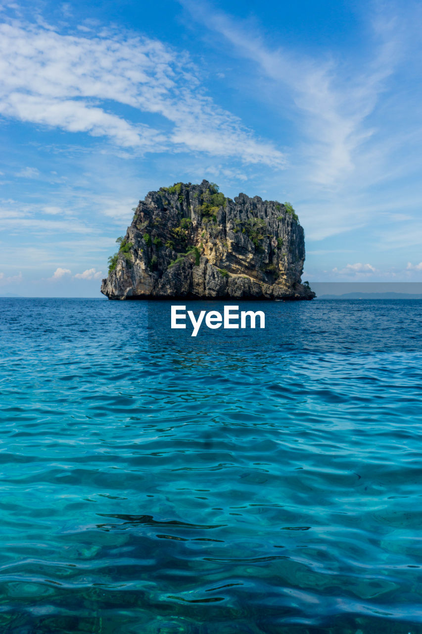 water, sea, islet, sky, land, beauty in nature, ocean, scenics - nature, island, horizon, nature, rock, tranquility, beach, blue, tranquil scene, archipelago, idyllic, shore, coast, cloud, horizon over water, body of water, travel destinations, no people, seascape, travel, bay, outdoors, tropical climate, holiday, trip, lagoon, vacation, environment, coastline, day, turquoise colored, rock formation, landscape, wave, non-urban scene, tourism, summer, terrain, cliff, waterfront, wind wave