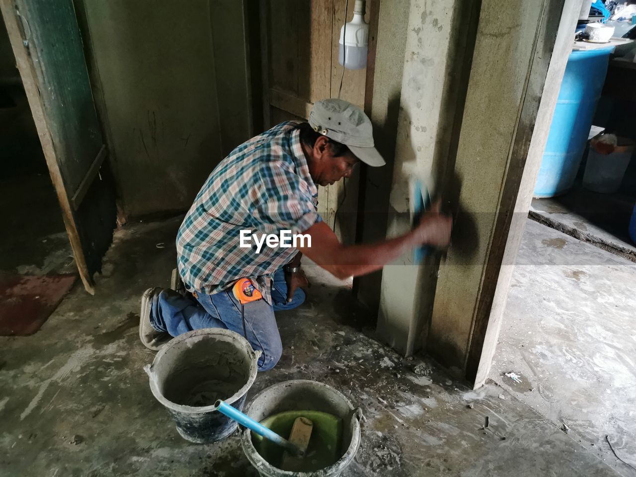 MAN WORKING IN CONTAINER