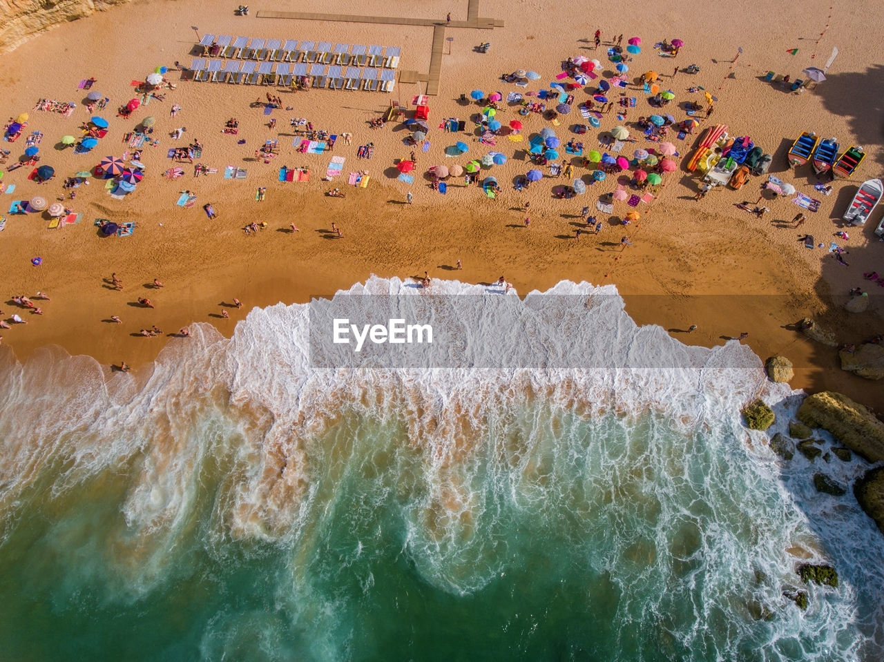 Aerial view of people enjoying at beach