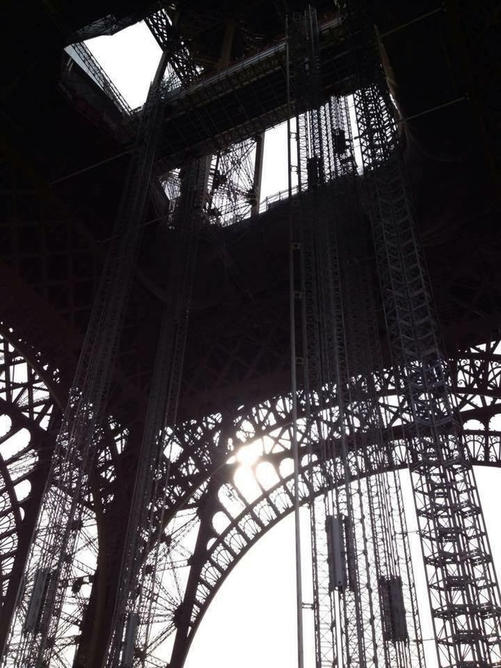 LOW ANGLE VIEW OF ILLUMINATED EIFFEL TOWER AGAINST SKY