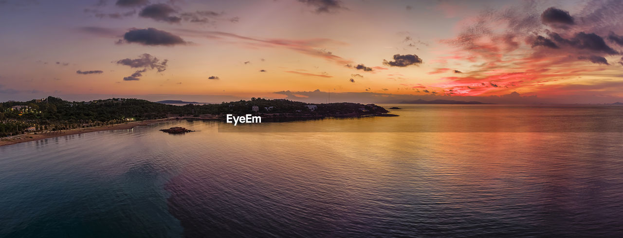 SCENIC VIEW OF SEA DURING SUNSET