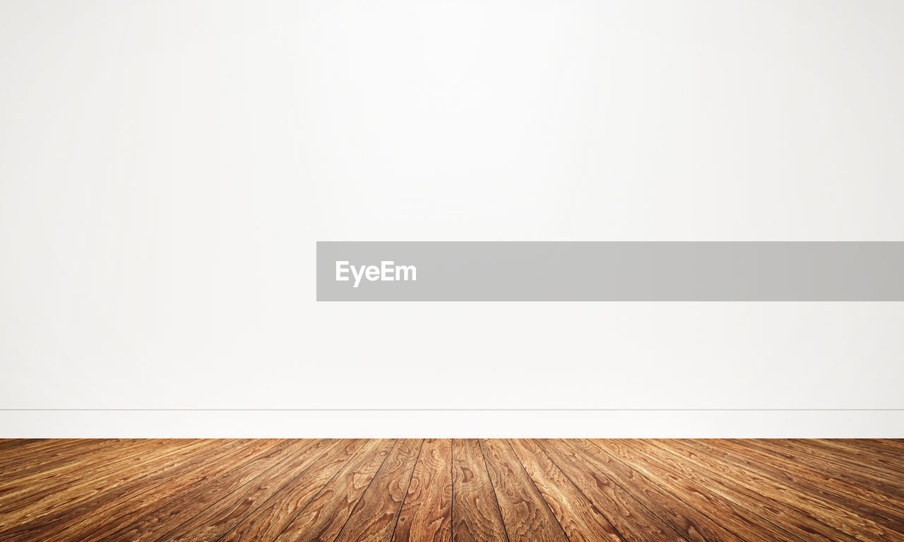 EMPTY WOODEN FLOOR AT HOME