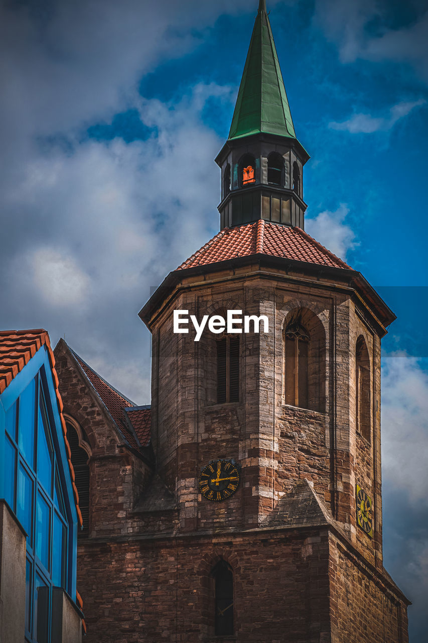 Low angle view of church against sky