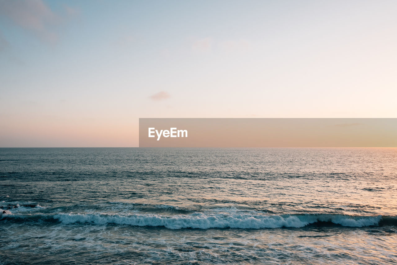 SCENIC VIEW OF SEA DURING SUNSET