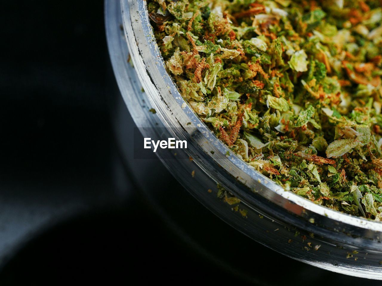 Close-up of marijuana on table