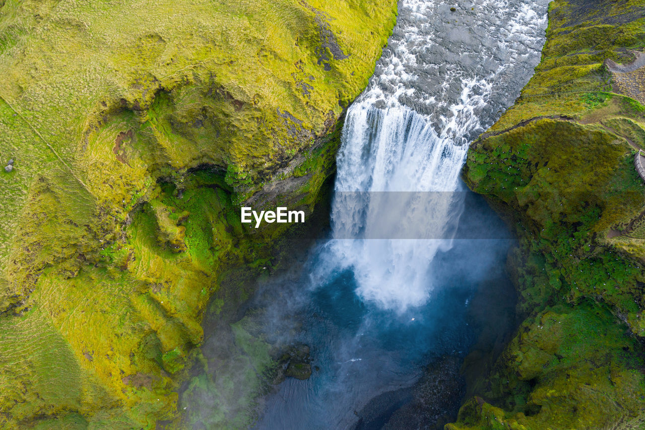 Skogafoss waterfall by drone, aerial view, iceland