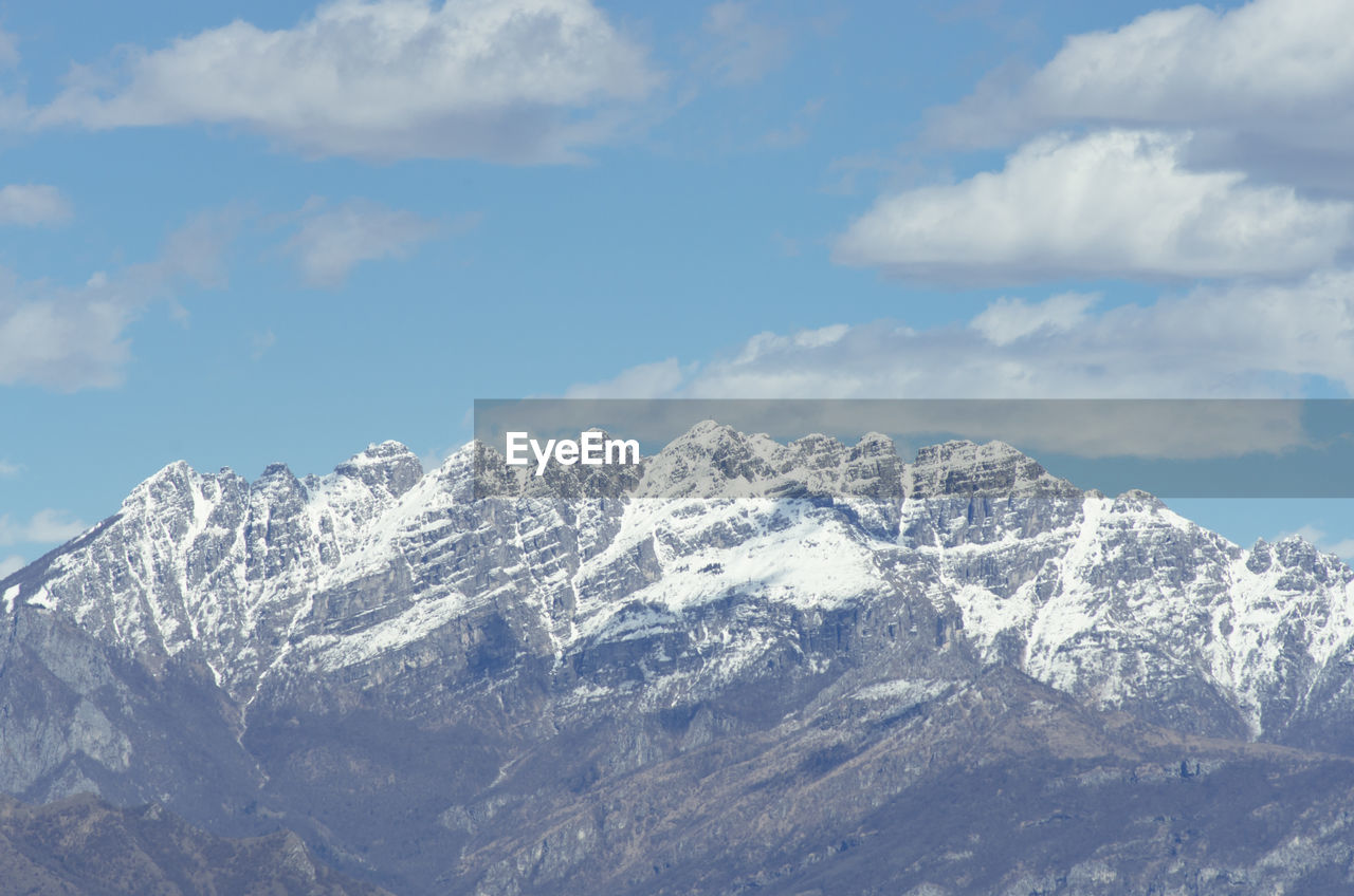 SNOWCAPPED MOUNTAIN AGAINST SKY