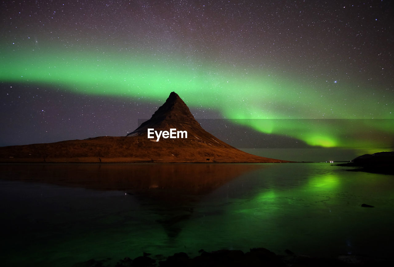 Scenic view of lake at night