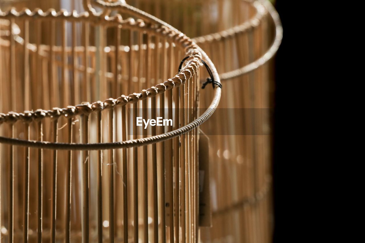 Close-up of metal hanging against white background