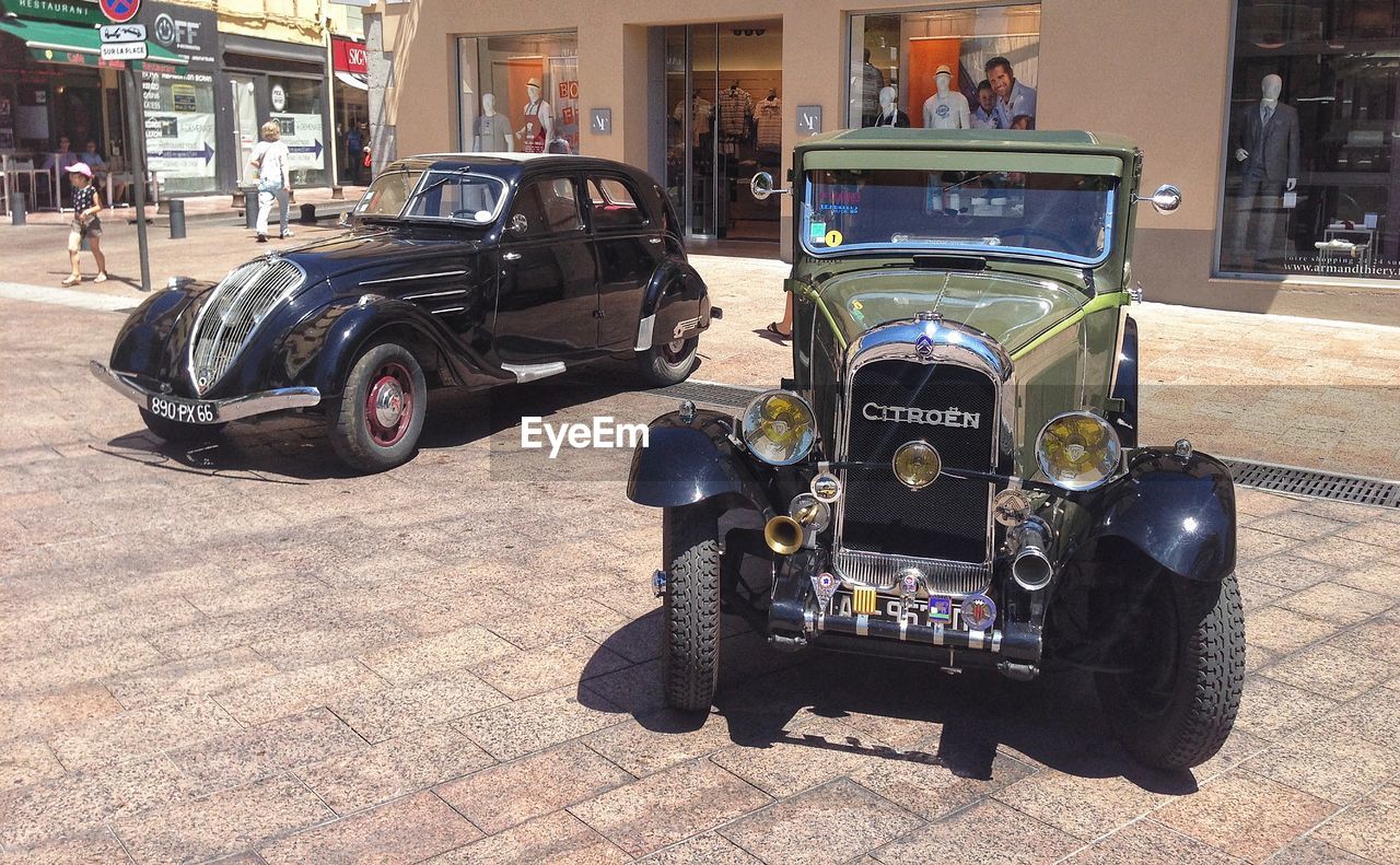 VINTAGE CAR PARKED ON STREET