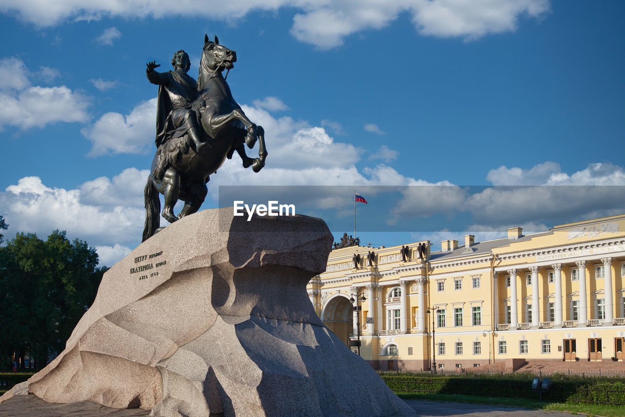 Low angle view of statue against cloudy sky. monument to peter i the bronze horseman