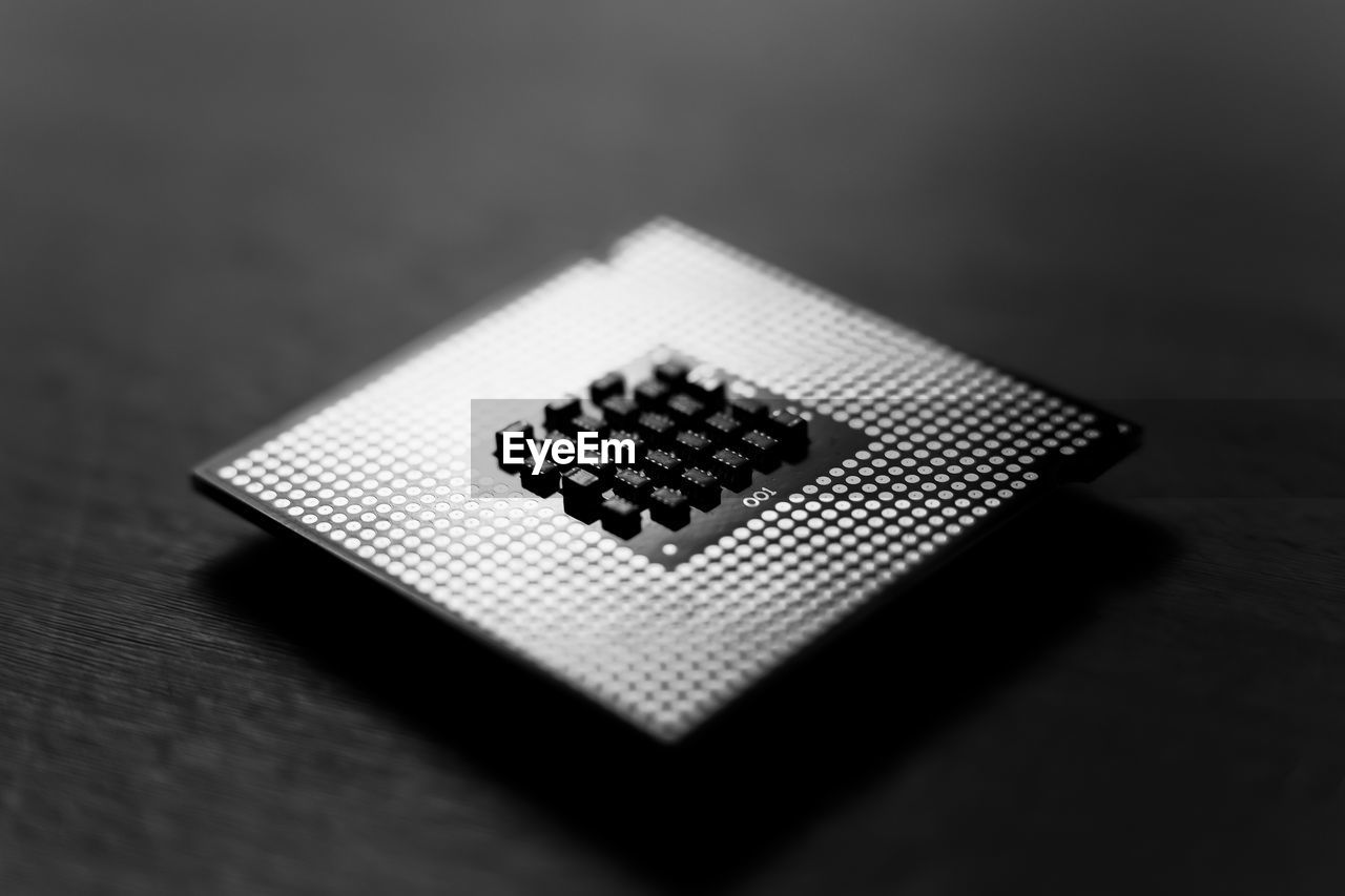 Close-up of computer chip on table