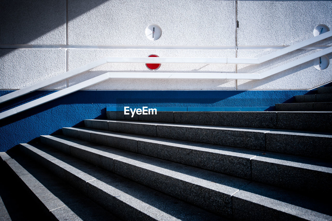 Empty staircase against wall