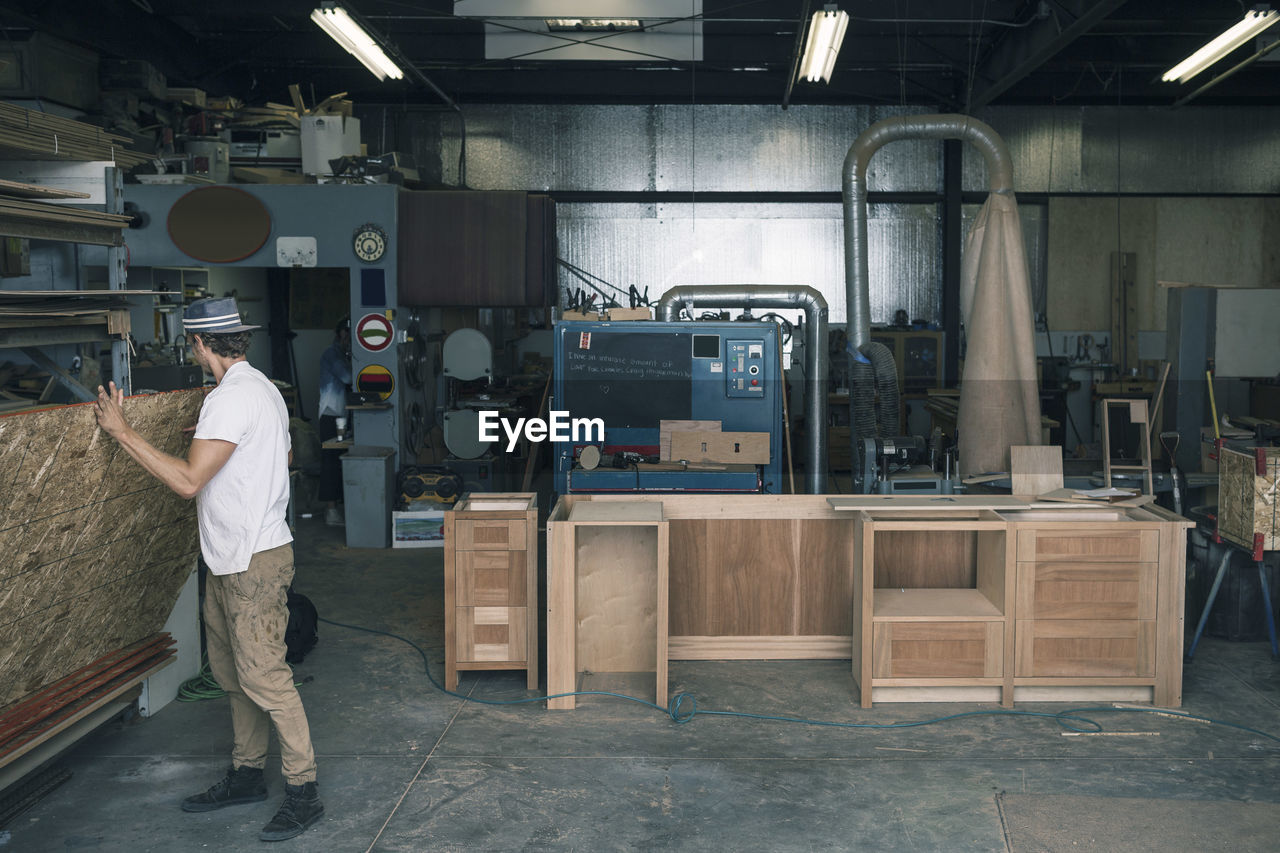 Carpenter working at workshop