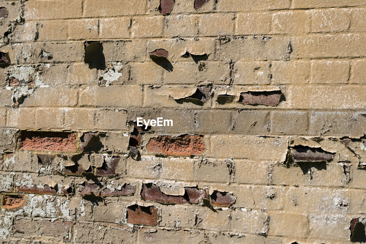 Full frame shot of abandoned brick wall