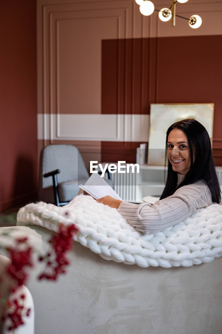 Young woman sleeping on bed at home