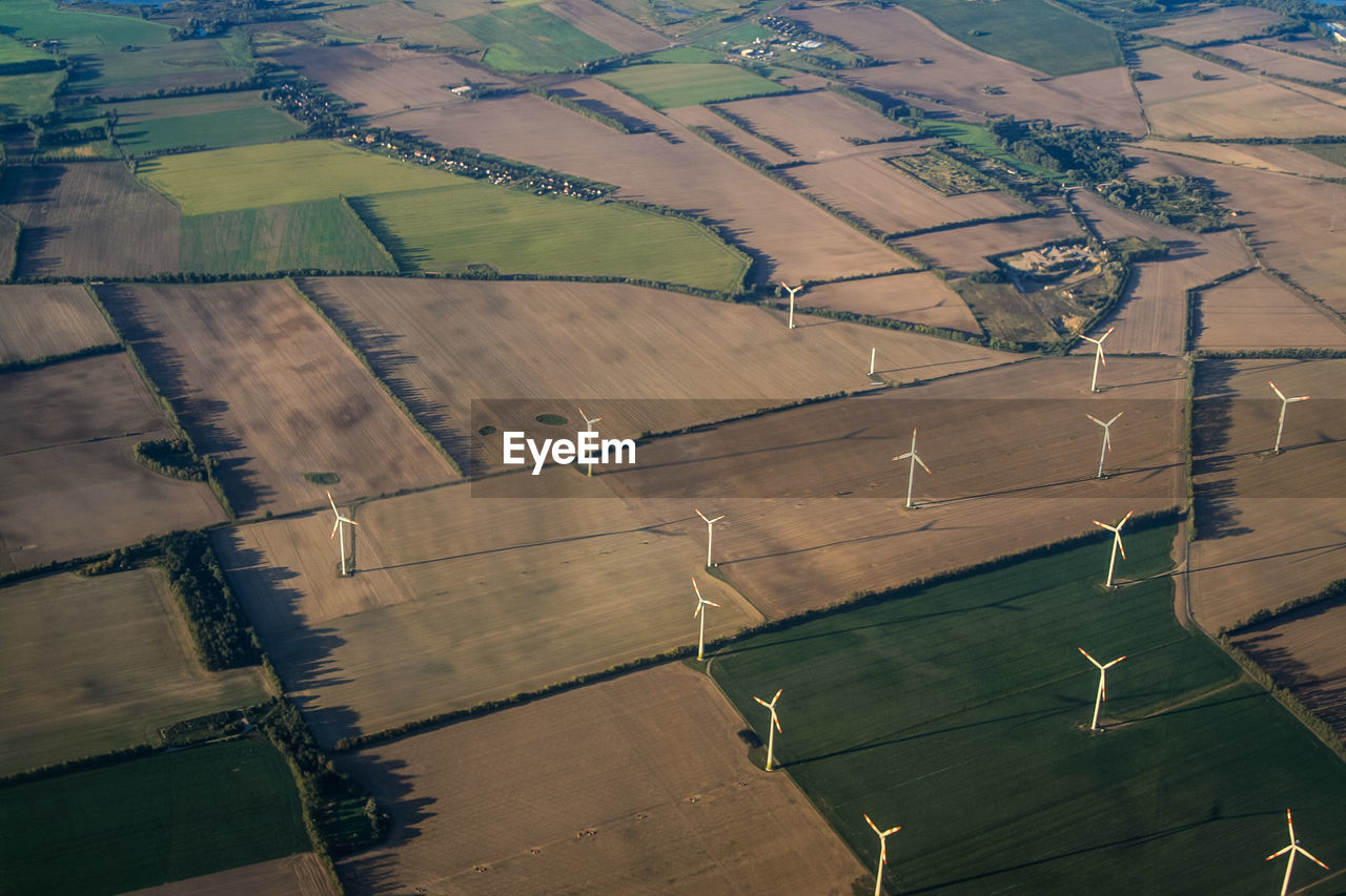 Aerial view of windmills on landscape