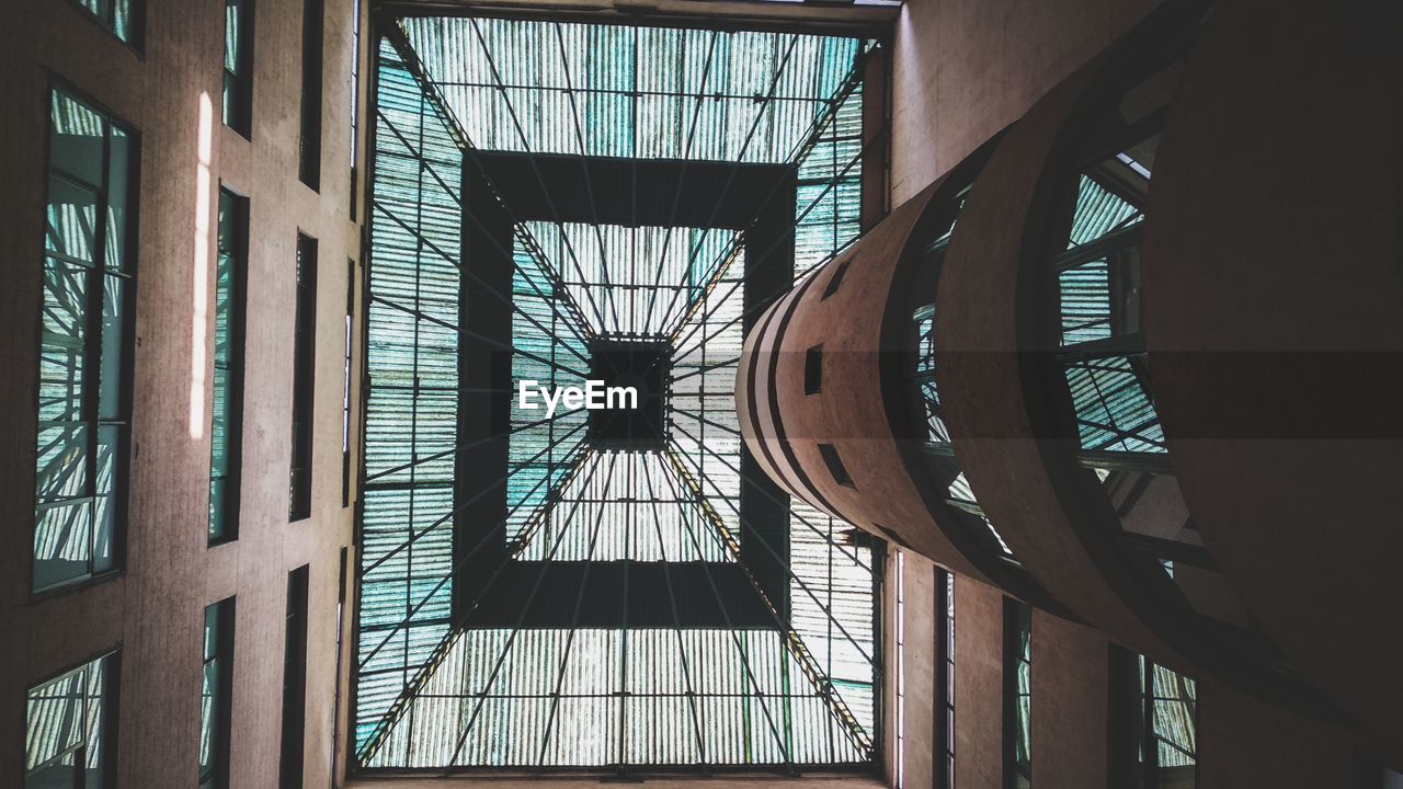 Low angle view of skylight in building