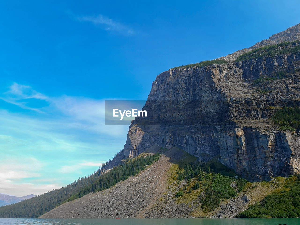 ROCK FORMATIONS ON LANDSCAPE AGAINST SKY