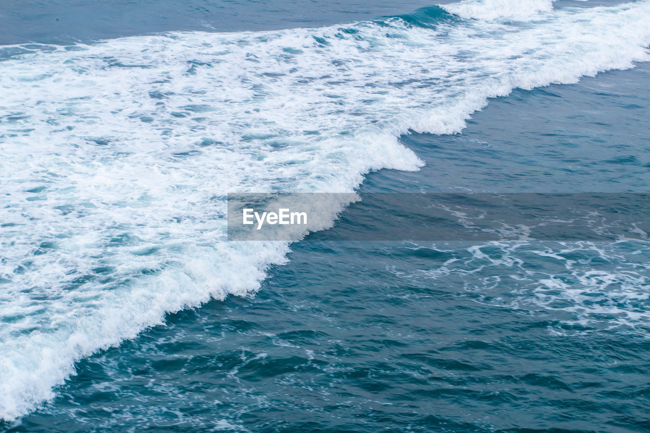 wind wave, water, sea, ocean, wave, motion, beauty in nature, coast, no people, sports, water sports, nature, scenics - nature, day, outdoors, blue, high angle view, shore, horizon, land, beach, idyllic, splashing