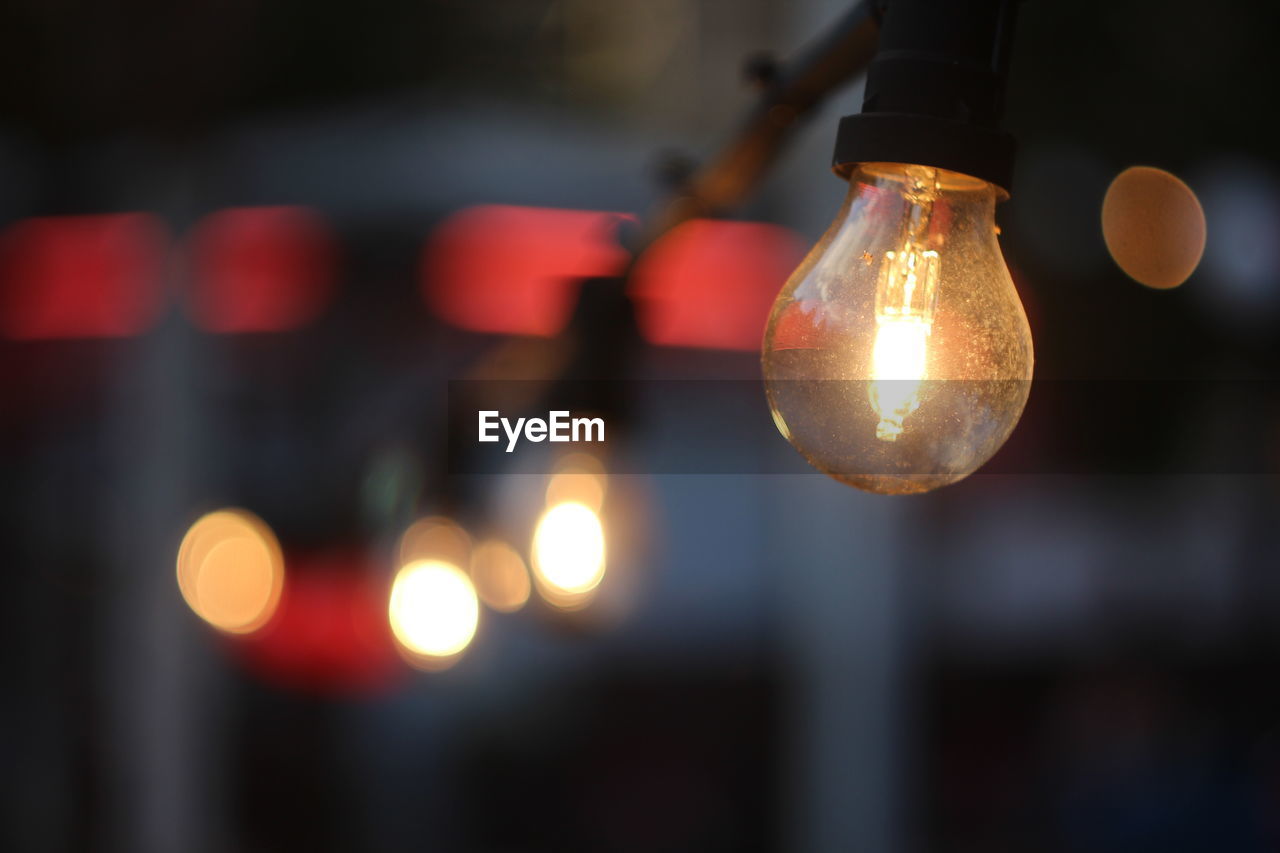 Close-up of illuminated light bulb