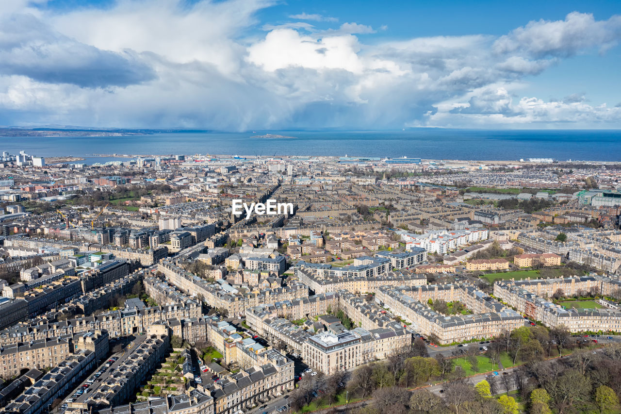 Aerial view of cityscape against sky