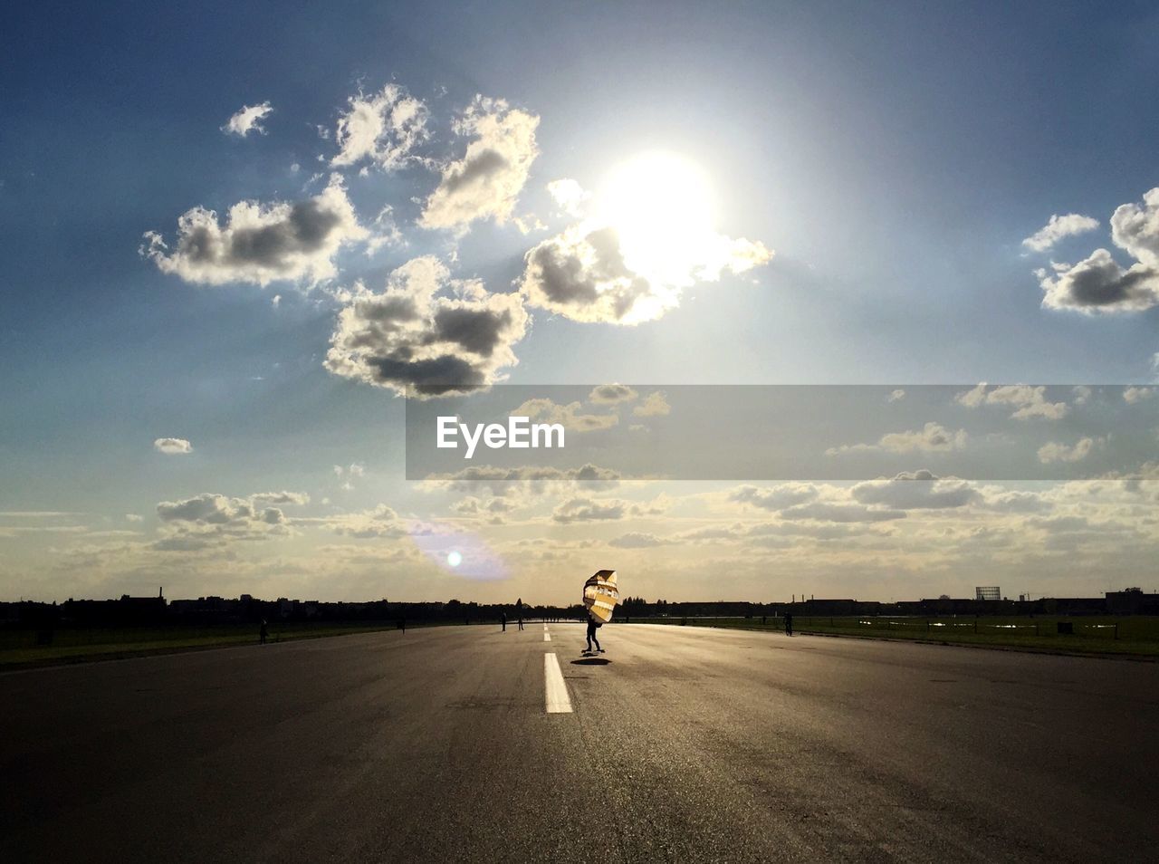 View of tempelhofer feld against sky on sunny day