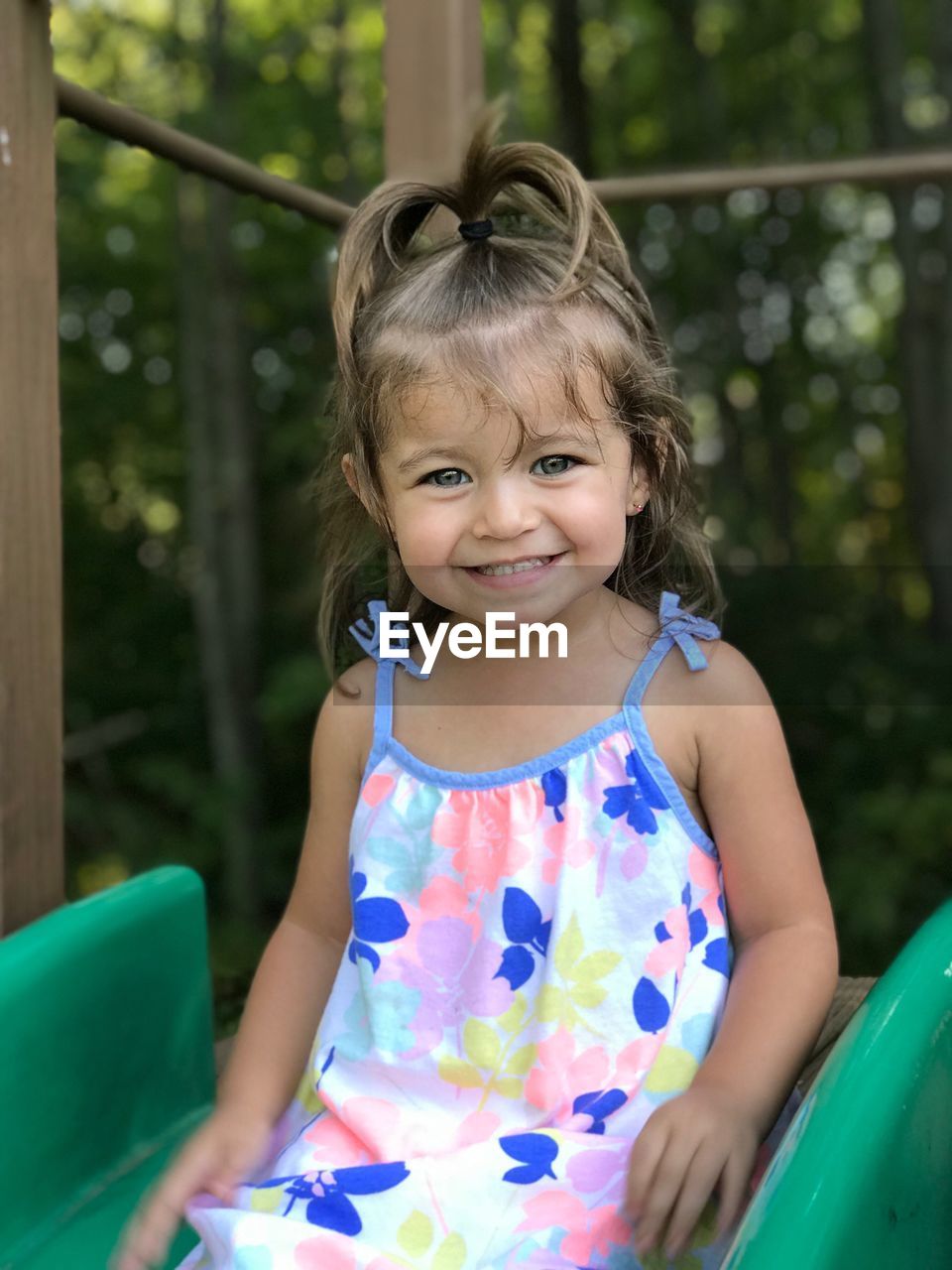 PORTRAIT OF SMILING GIRL