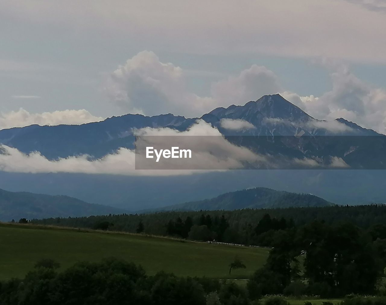 SCENIC VIEW OF LAND AND MOUNTAINS AGAINST SKY