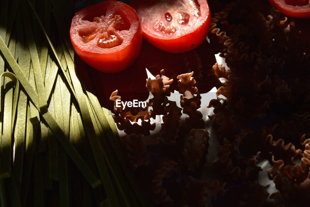 CLOSE-UP OF FRUITS IN PLATE ON TABLE