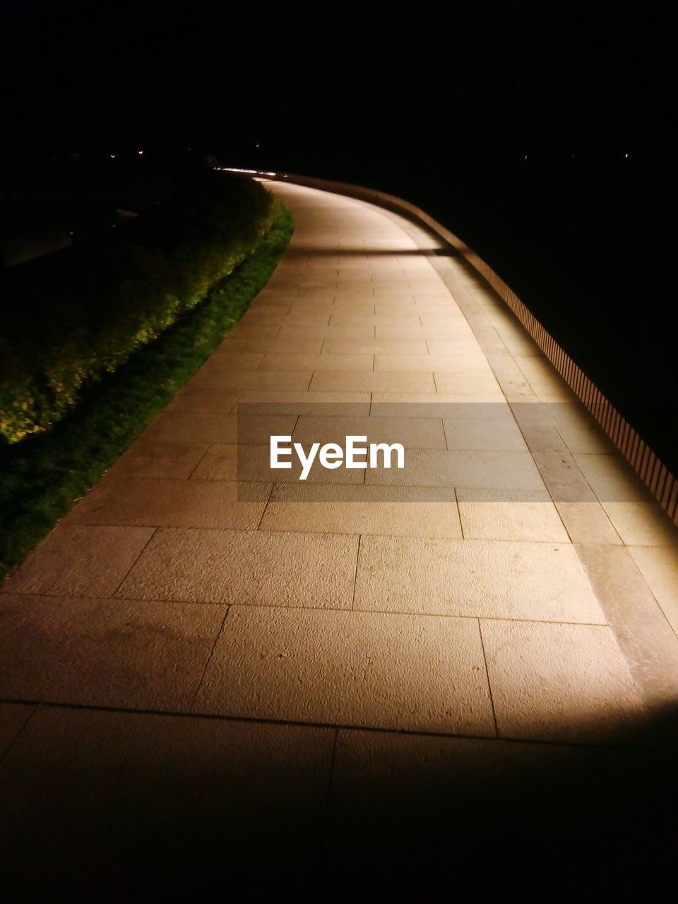 HIGH ANGLE VIEW OF ILLUMINATED LIGHTS ON FOOTPATH