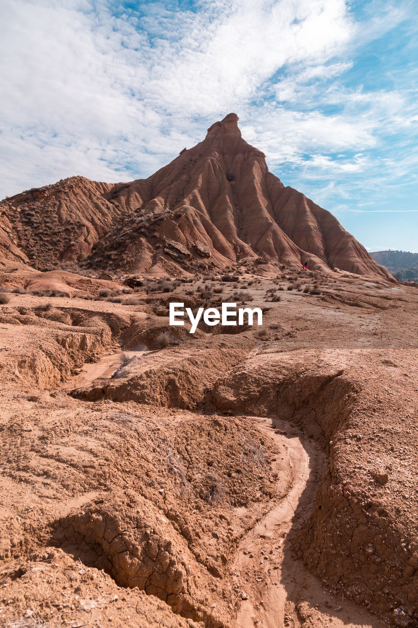 Rock formations in desert against sky