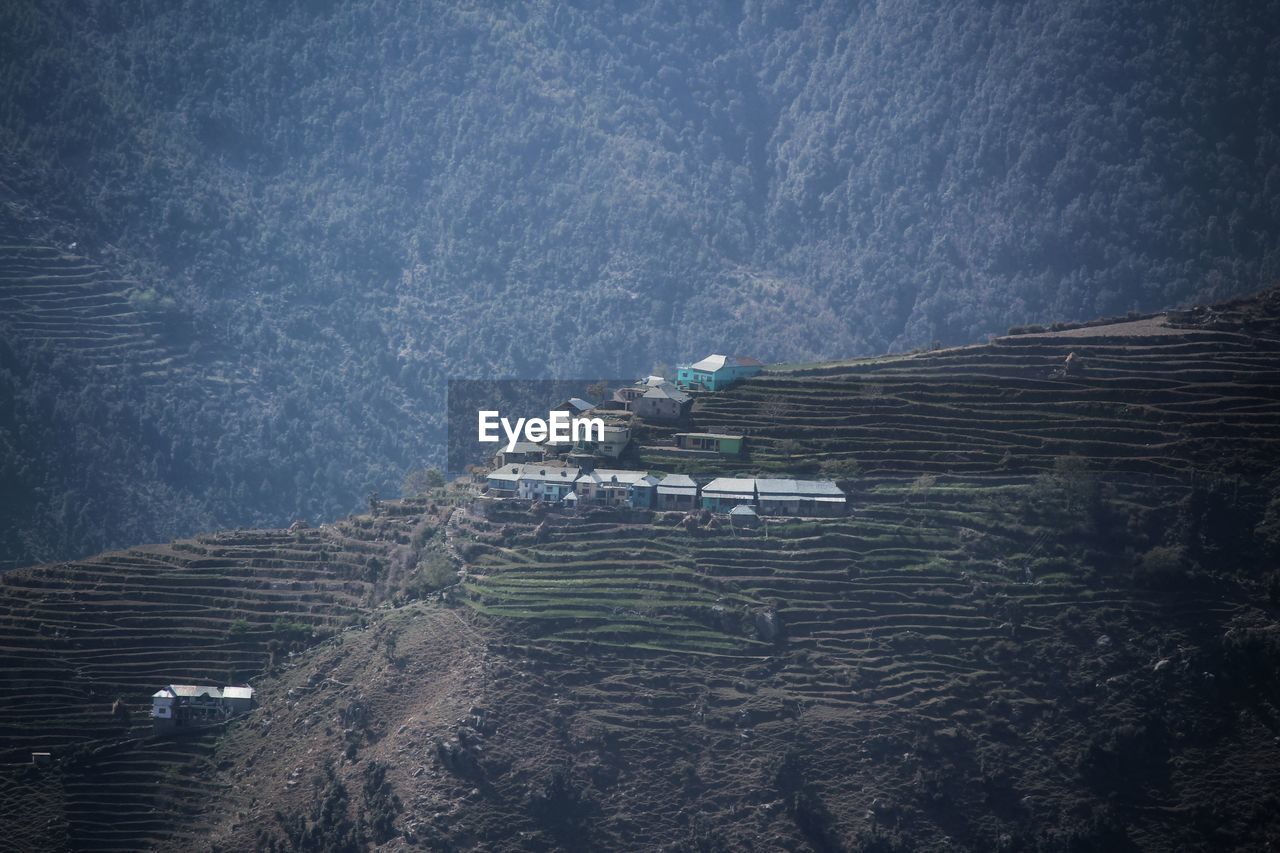 High angle view of plants on land against mountain