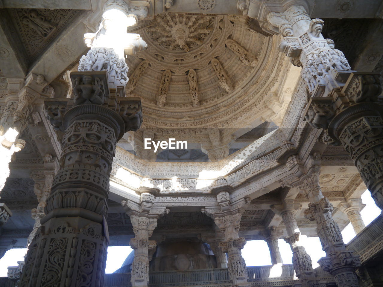 LOW ANGLE VIEW OF STATUES AGAINST SKY