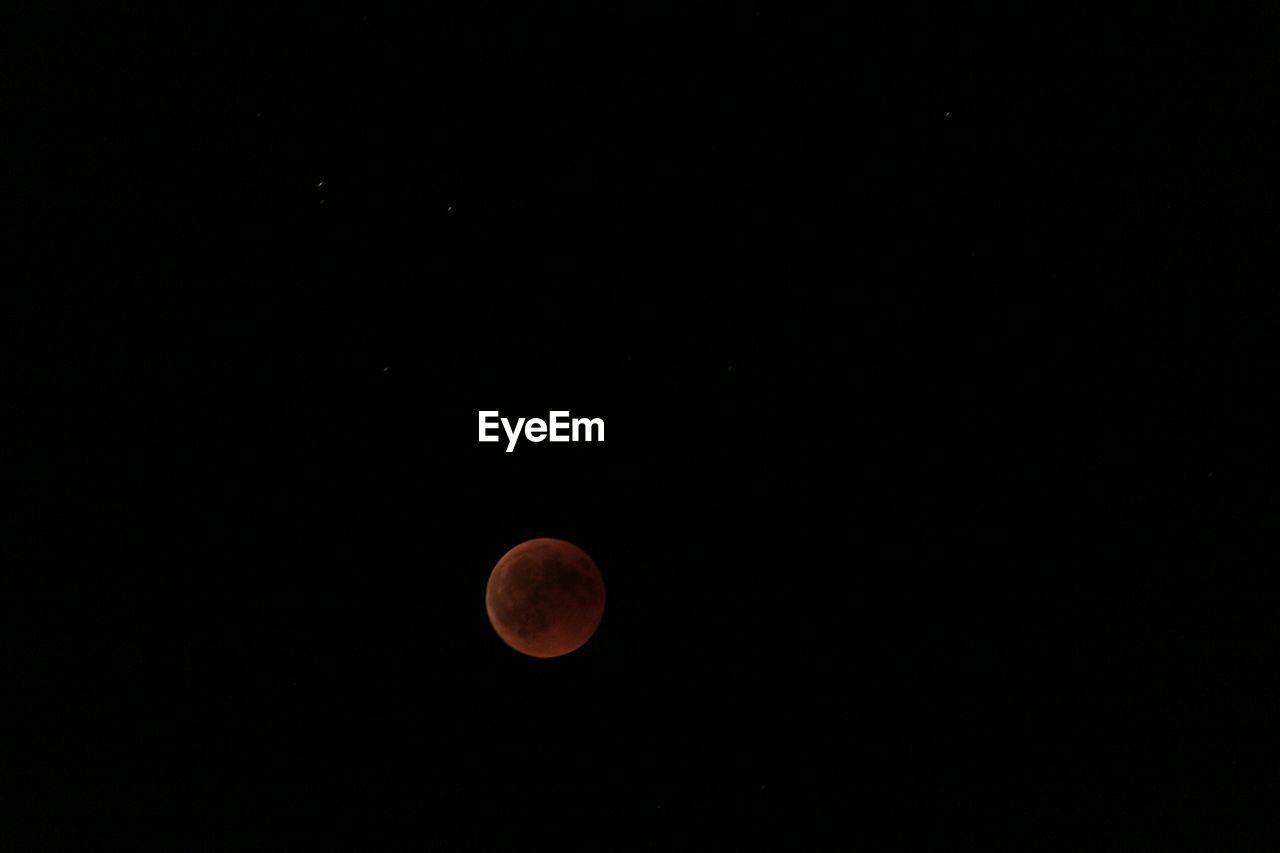 LOW ANGLE VIEW OF MOON AGAINST SKY