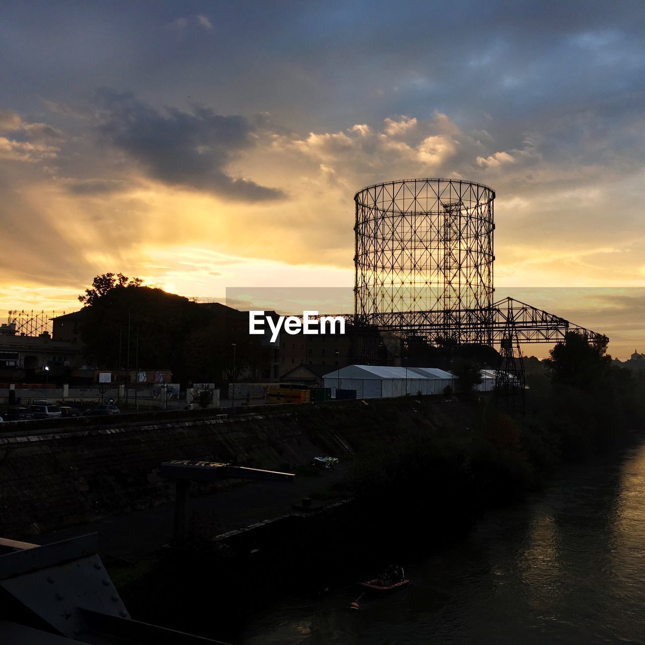 SILHOUETTE OF WATER TOWER DURING SUNSET