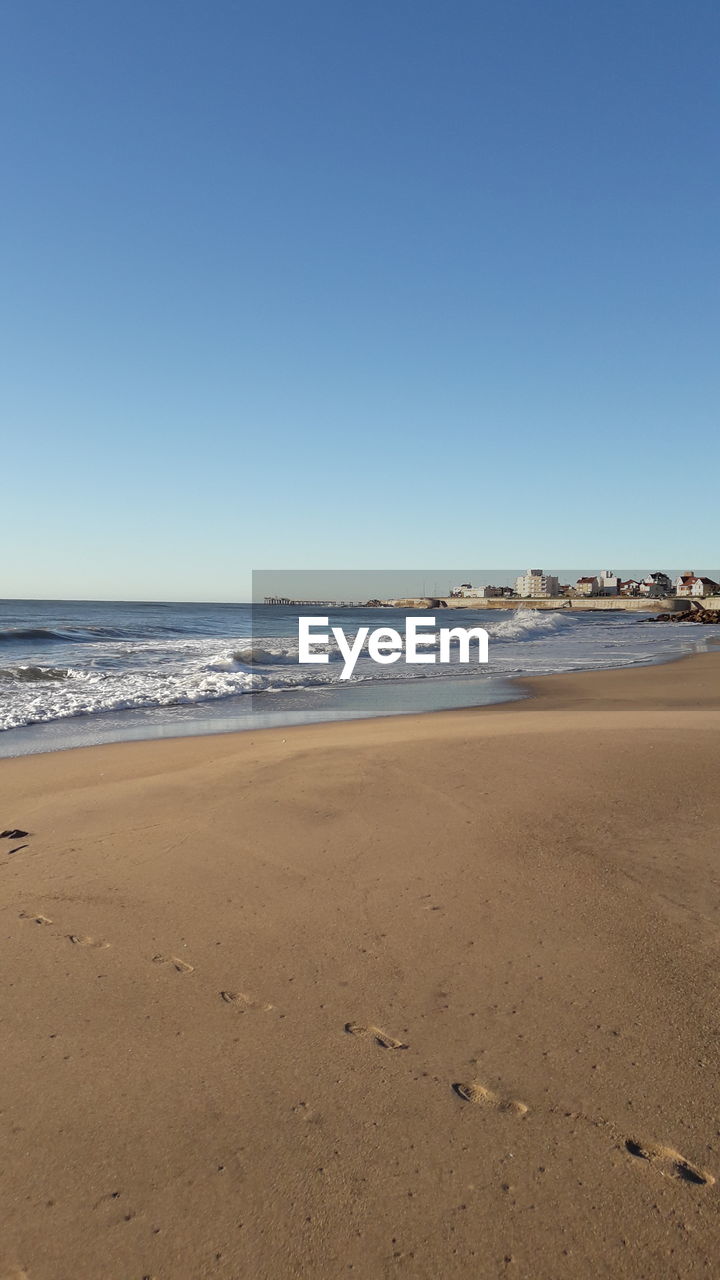 BEACH AGAINST CLEAR SKY